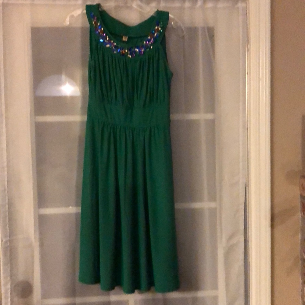 Green dress with jeweled neckline